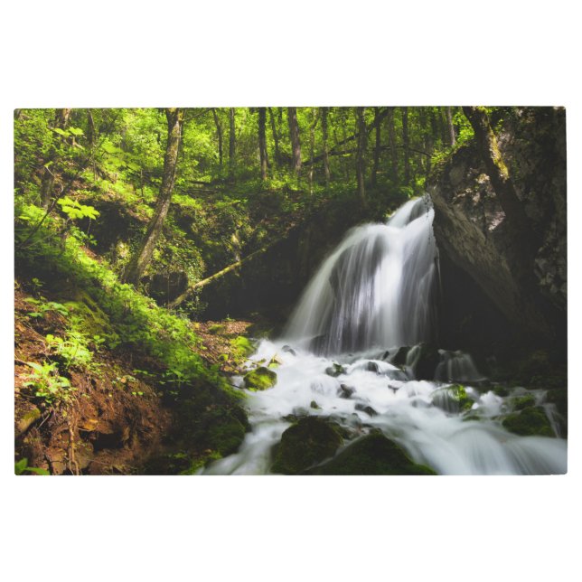 Magical waterfall in enchanting green forest metal print (Front)