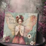 Magical Whimsical Fairy & Flower Garden with Quote Plaque<br><div class="desc">Add a touch of enchantment to your home with this **Whimsical Fairy & Flower Garden Tabletop Plaque with Easel**. Featuring a delicate pastel-colored fairy surrounded by a beautiful garden, this plaque is adorned with the uplifting quote, "Magic in Every Flutter." The intricate, whimsical art and soft, dreamy colors create a...</div>
