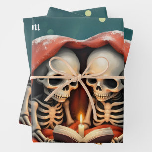 Magical winter moments, two skeletons wrapping paper sheets