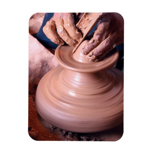 Magnets man works in a pottery pot Safi Morocco