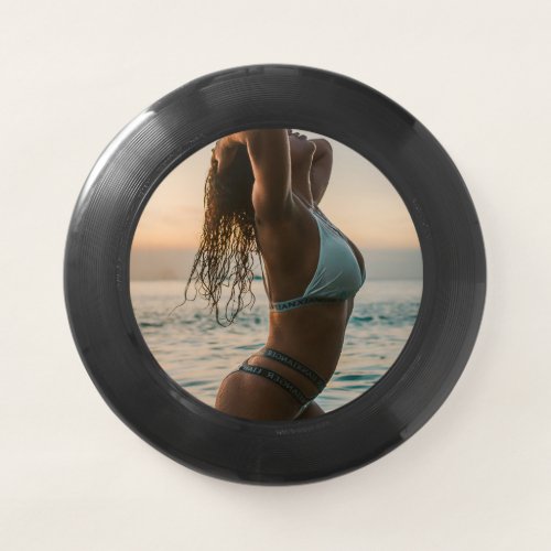 magnificent female model posing in water Frisbees