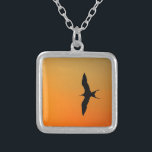 Magnificent frigate bird flying orange sunset silver plated necklace<br><div class="desc">Magnificent frigate bird flying orange sunset Galapagos Islands</div>