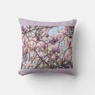 Magnolia blooming tree throw pillow