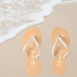 Maid of Honor Trendy Peach Color Flip Flops<br><div class="desc">Gift your wedding bridesmaids with these stylish Maid of Honor flip flops that are a trendy peach color along with white, stylized script to complement your similar wedding color scheme. Select foot size along with other options. You may customize your flip flops to change color or text font style to...</div>