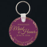 Maid of Honor Wedding Gift Cassis Purple & Gold Keychain<br><div class="desc">These keychains are designed to give as favors to the Maid of Honor in your wedding party. They feature a simple yet elegant design with a cassis purple, magenta, or berry colored background, gold text, and a golden faux foil floral lace border. Perfect way to thank your Maid of Honor...</div>