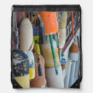 Maine, Bar Harbor. Colorful lobster trap buoys Drawstring Bag