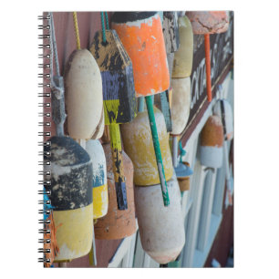 Maine, Bar Harbor. Colorful lobster trap buoys Notebook