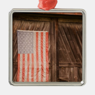 Maine, Faded American flag on door of old barn Metal Ornament