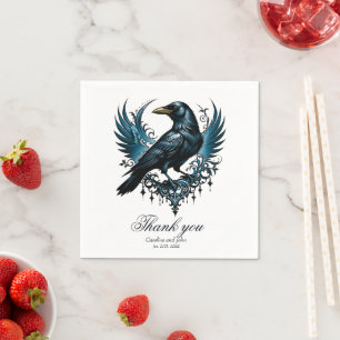 Majestic black raven sitting on an ornate napkins