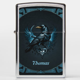 Majestic black raven sitting on an ornate zippo lighter
