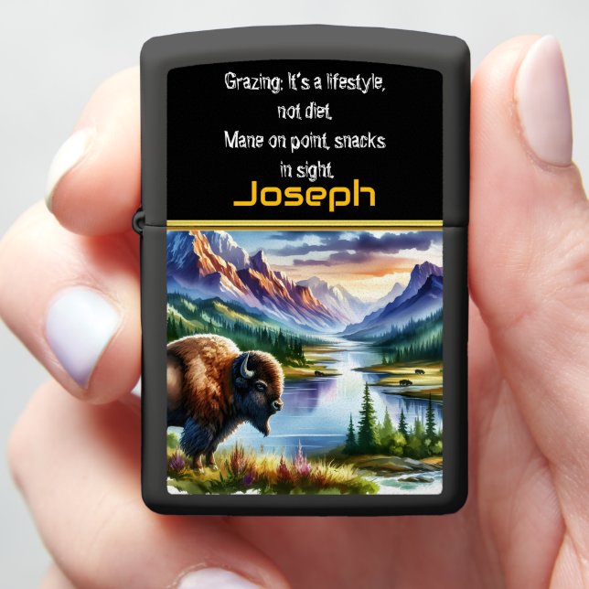 Majestic Buffalo Grazing by a Serene Mountain Lake Zippo Lighter (In Hand)