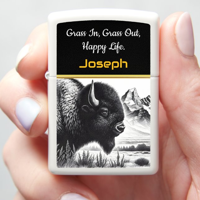 Majestic Buffalo Grazing Near Rugged Mountains Zippo Lighter (In Hand)