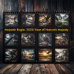 Majestic Eagle: A Year of Nature's Majesty 2025  Calendar<br><div class="desc">Experience the awe-inspiring presence of the eagle, a symbol of freedom and power, with this stunning 2025 calendar. Each month showcases the majestic bird in its natural habitat, captured against the backdrop of rustic, weathered dark wood. From soaring above snow-capped mountain peaks to patiently watching over its nest at dawn,...</div>