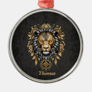 Majestic golden lion head with black mane. metal ornament