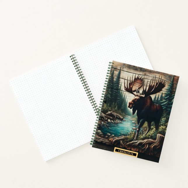 Majestic moose standing by a serene forest river notebook (Inside)