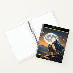 Majestic wolves howling under a bright full moon notebook