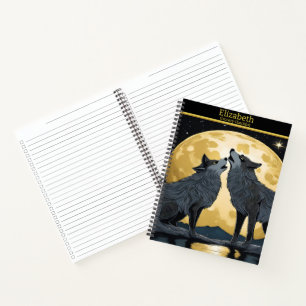 Majestic wolves serenade the glowing moonlight notebook