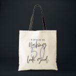 Making 50 look good age birthday personalized tote bag<br><div class="desc">Making 50 look good age birthday typographic personalized birthday gift shirt. Life begins at fifty, show how happy you are to be in your fifties with this shirt, ideal for a birthday party or celebration weekend away. Make it a party to remember with the awesome outfit or a ideal gift...</div>