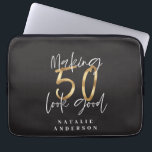 Making 50 look good gold birthday celebration laptop sleeve<br><div class="desc">Celebrate your 50th birthday in style with this black,  white and gold effect 50 and fabulous birthday design. A modern design with script text and bold graphics. Change the colour to customise. Part of a collection.</div>