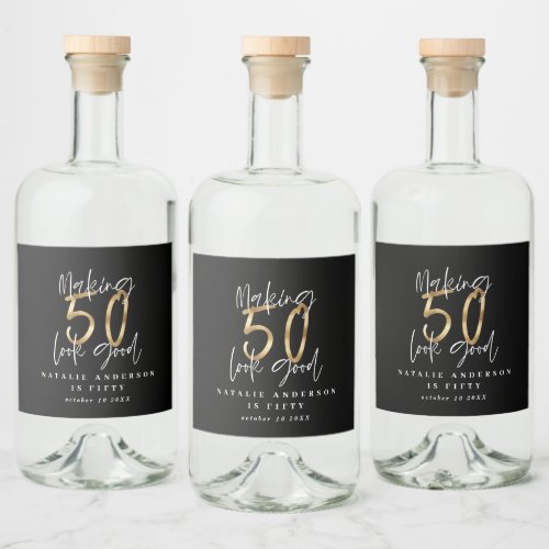 Making 50 look good gold birthday celebration wate liquor bottle label