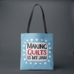 Making Quilts Is My Jam Tote Bag<br><div class="desc">"Making Quilts Is My Jam" is a cute text design in blue with black and red text,  along with a white accent shape and white textured whimsical dots surrounding it.</div>
