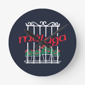 Malaga, window with flowers round clock