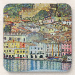 Malcesine on Lake Garda By Gustav Klimt Drink Coaster<br><div class="desc">Malcesine on Lake Garda (1913) by Gustav Klimt is a vintage Victorian Era Art Nouveau fine art symbolism painting. A beautiful view of the Italian city of Malcesine with buildings and houses on the edge of the harbor. The homes and boats cast a reflection in the calm water. You can...</div>