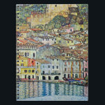 Malcesine on Lake Garda By Gustav Klimt Notebook<br><div class="desc">Malcesine on Lake Garda (1913) by Gustav Klimt is a vintage Victorian Era Art Nouveau fine art symbolism painting. A beautiful view of the Italian city of Malcesine with buildings and houses on the edge of the harbor. The homes and boats cast a reflection in the calm water. You can...</div>