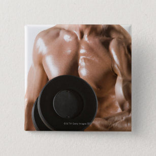 Male body builder flexing lifting weight pinback button