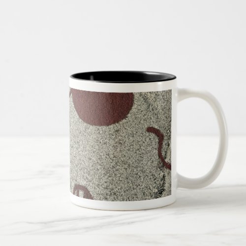 Male figure with the sun Two_Tone coffee mug