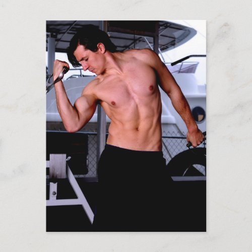 Male fitness model working out postcard