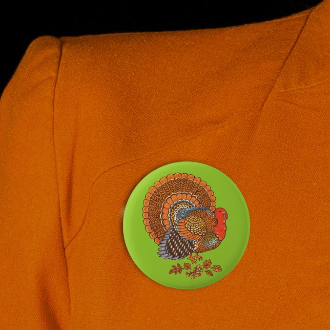 Male Turkey Colourful Feathers on Green Pinback Button (Male turkey Autumn colors in leaves on green Thanksgiving round pin back button.)