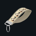 Mallard Ducks Wrist Keychains<br><div class="desc">This animal wrist keychain features an artistic rendering of Mallard Ducks. The male ducks can be identified by their iridescent green heads and yellow beaks. The females have lovely feathers in shades of brown and gold with orange beaks.</div>