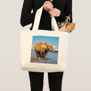 Mama bear watching her two kids large tote bag