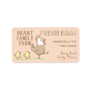 Mama hen and chicks on an egg-colored carton label