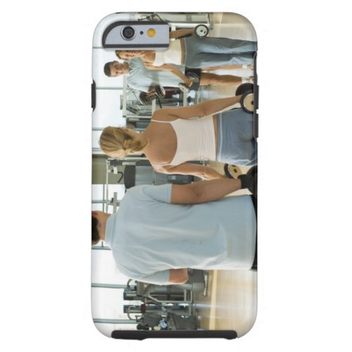 Man and woman lifting hand weights in front of a tough iPhone 6 case