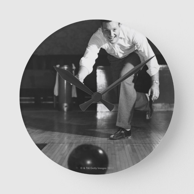 Man Bowling Round Clock (Front)