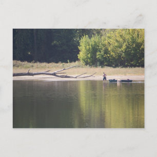 Man, Canoe, Dog, and Driftwood Postcard
