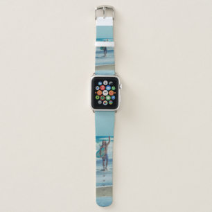 Man carrying surfboard at beach apple watch band