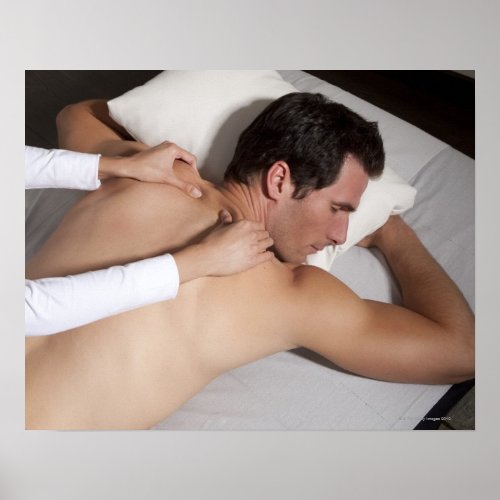 Man having a back massage from woman poster