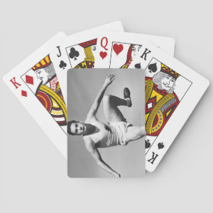 Man Hurdling Poker Cards