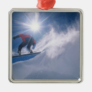 Man jumping off a large cornince on a snowboard metal ornament