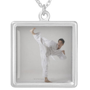 Man kicking high in the air, martial arts silver plated necklace
