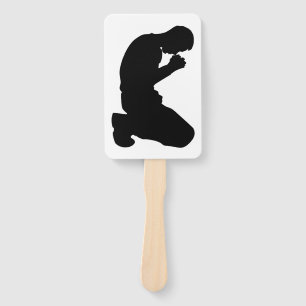 MAN KNEELING IN PRAYER HAND FAN