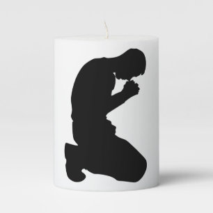 MAN KNEELING IN PRAYER PILLAR CANDLE