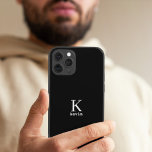 Man monogram name personalized simple black  iPhone 15 case<br><div class="desc">Modern simple masculine looking stylish iPhone case with black and white trendy typography (changeable colors).            Personalized gift for him: dad,  father,  husband,  son,  boyfriend,  groom,  best man,  groomsman,  business executive.</div>