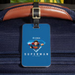 Man of Steel in Flight Luggage Tag<br><div class="desc">Take to the skies with the ultimate symbol of heroism! This dynamic Superman design features the legendary Kryptonian bursting through his iconic S-shield, fist forward, eyes locked on justice. Set against a vivid blue background with fluffy clouds, the artwork captures the unstoppable energy of Superman in full flight—ready to save...</div>