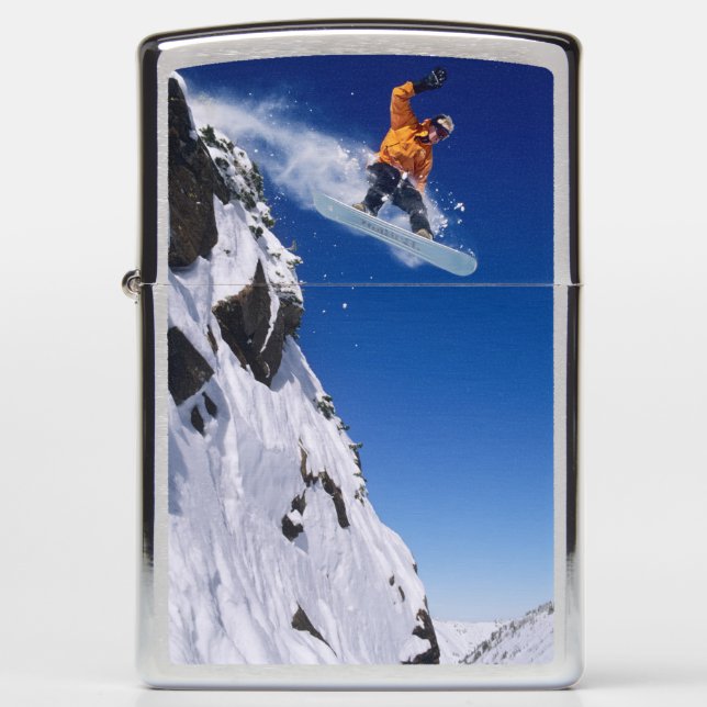 Man on a snowboard jumping off a cornice at zippo lighter (Front)