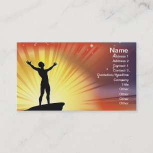 Man on cliff top with arms raised business card