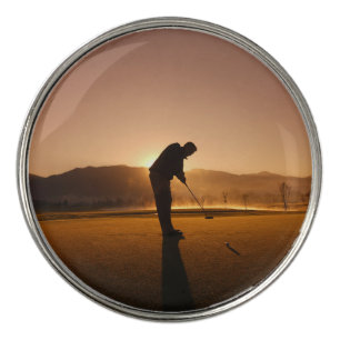 Man playing Golf at sunset Best Golf Ball Marker
